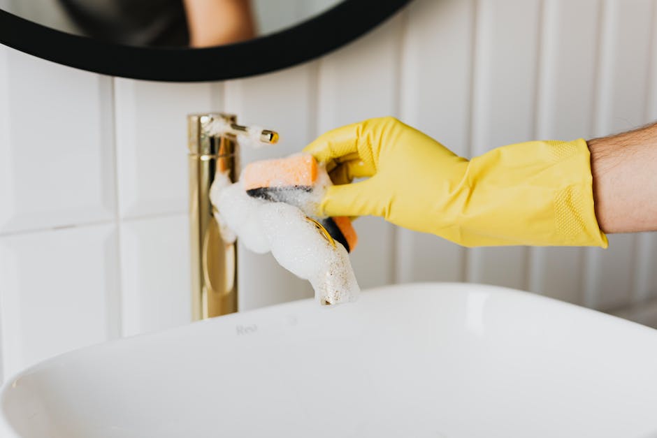 Scrubbing modern bathroom sink